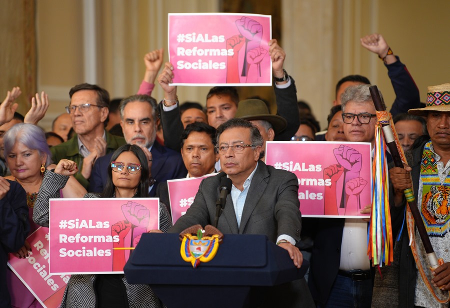 ame8702-colombia-reformas